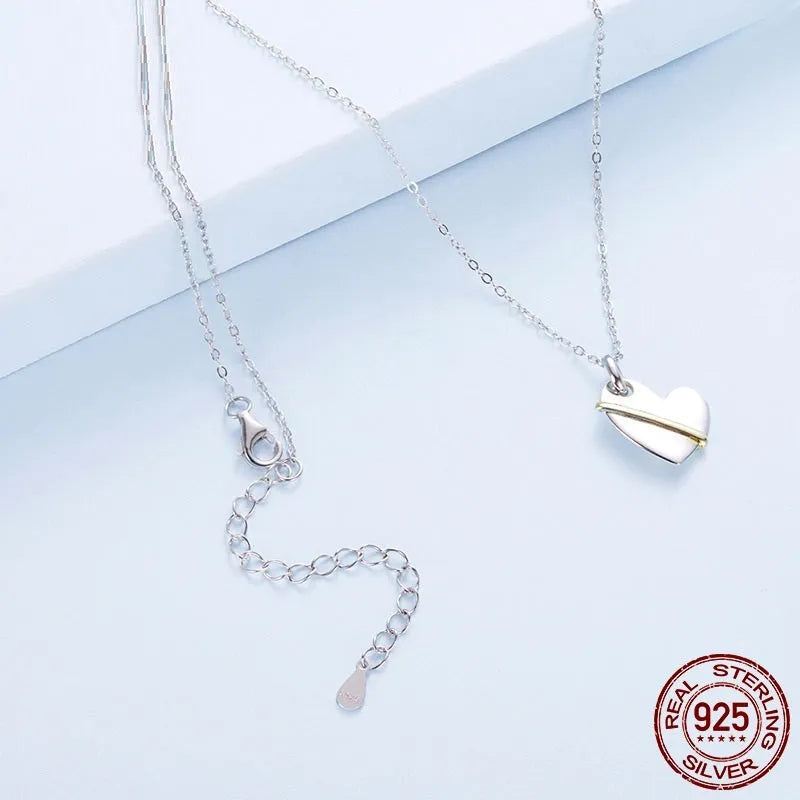 Original Hug Love 925 sterling silver heart necklace with adjustable O-ring chain on white background