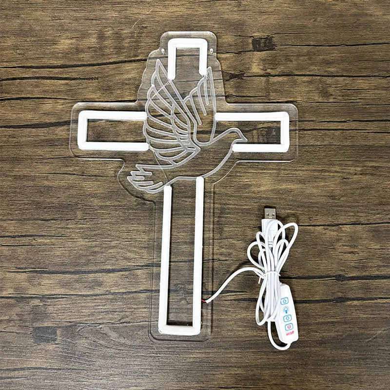 Acrylic LED neon light plate with peace dove cross design emitting white light on a dark background