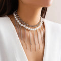 Women's double-layer retro necklace with white K electroplated finish, iron pendant, and imitation pearl tassel design