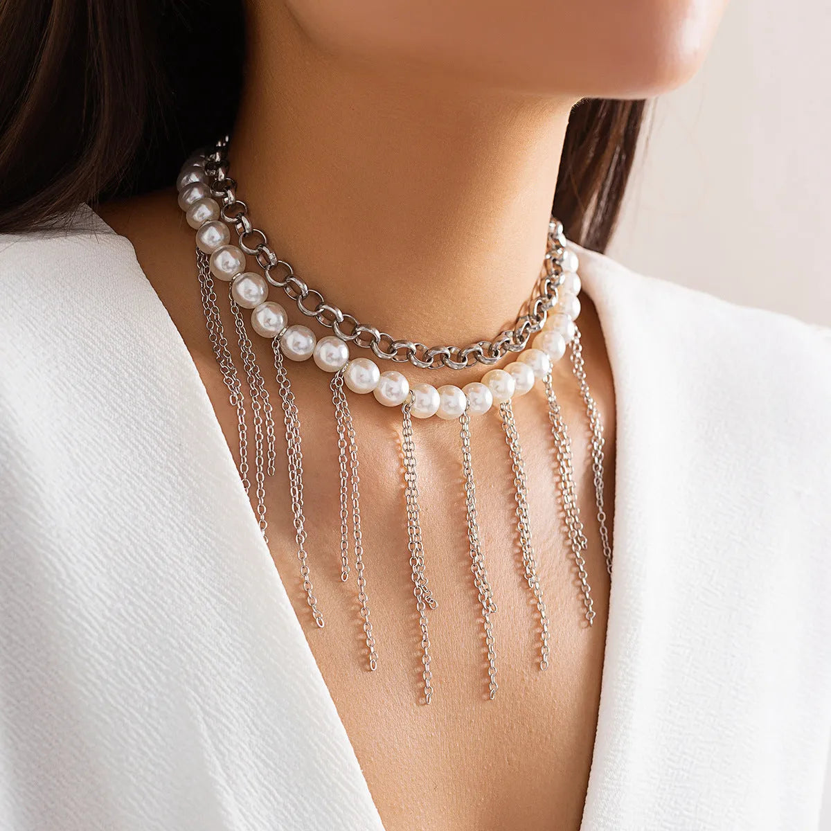 Women's double-layer retro necklace with white K electroplated finish, iron pendant, and imitation pearl tassel design
