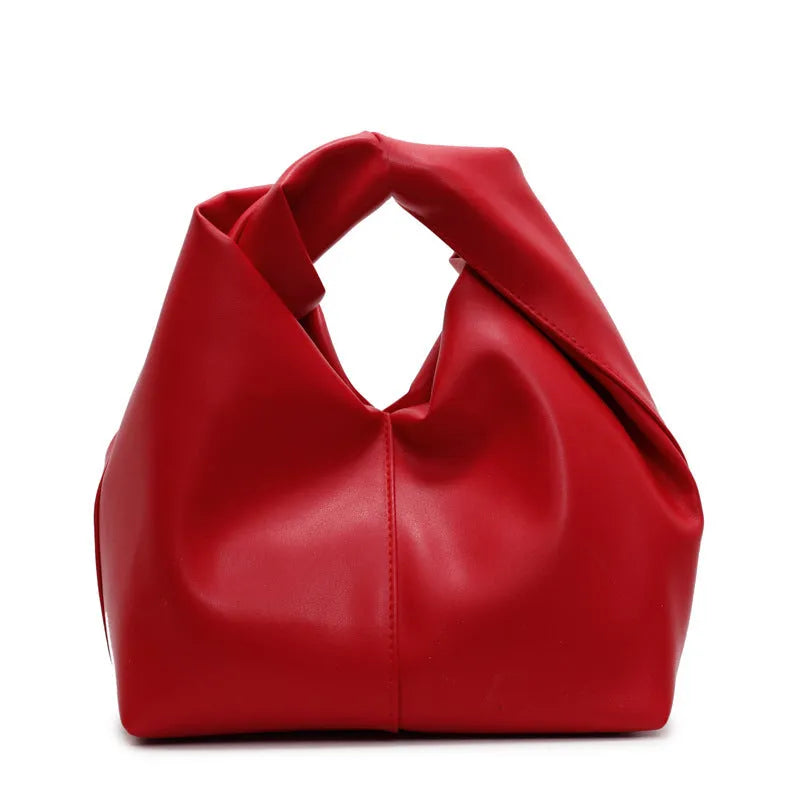 Women's casual PU leather dumpling-shaped handbag in multiple colours with internal organiser pockets.