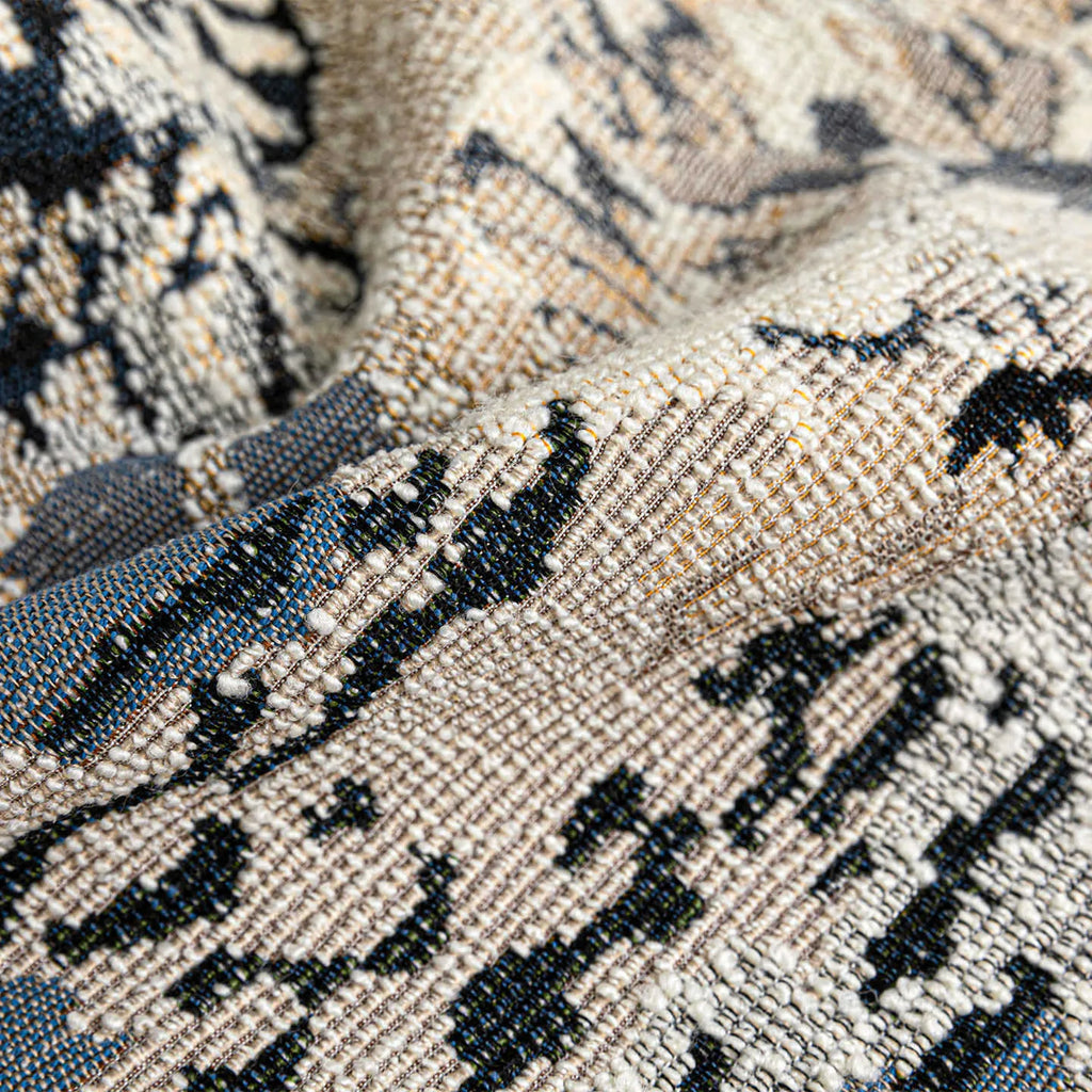 Antique blue floral patterned cushion cover in wool blend fabric, shown in square and rectangular sizes.