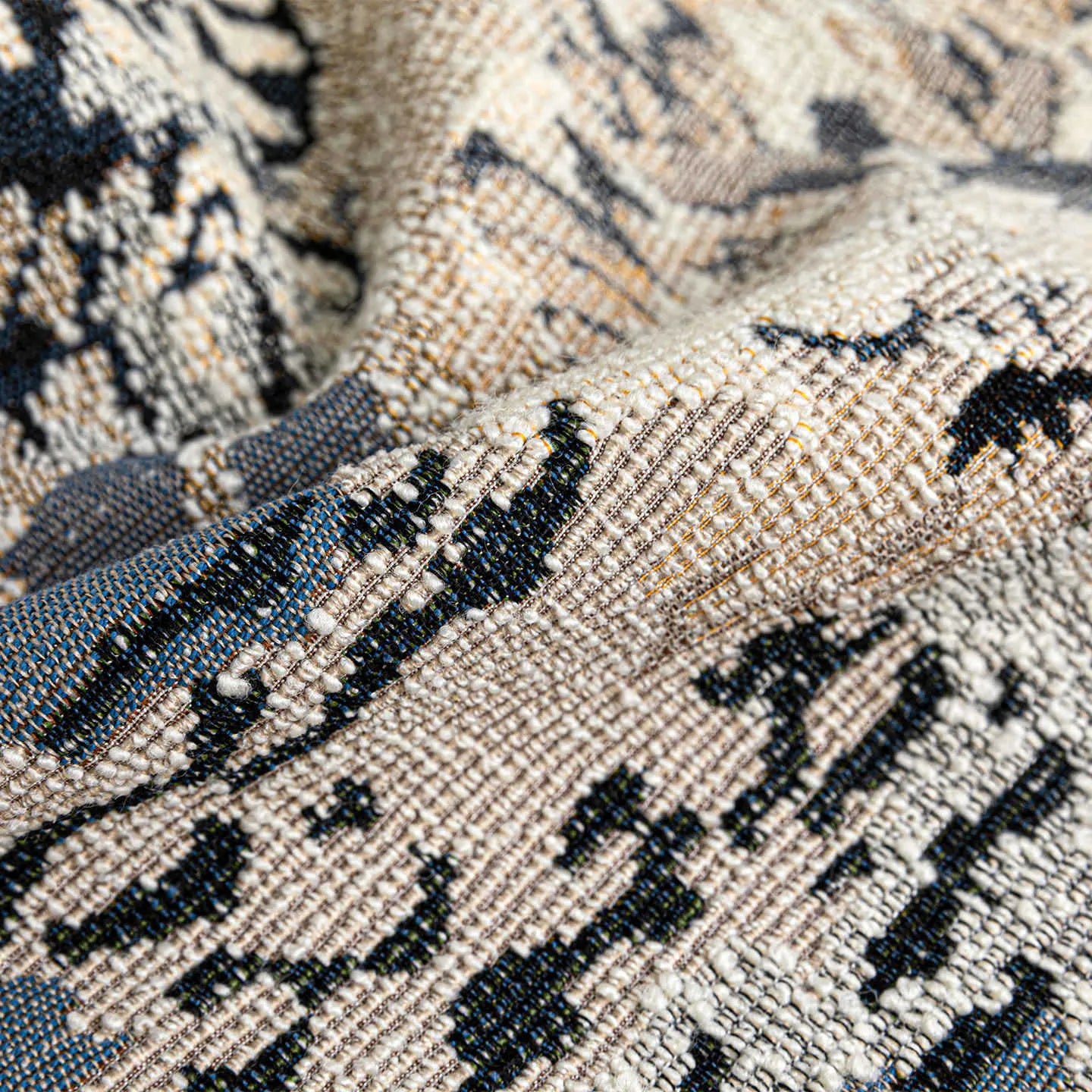 Antique blue floral patterned cushion cover in wool blend fabric, shown in square and rectangular sizes.