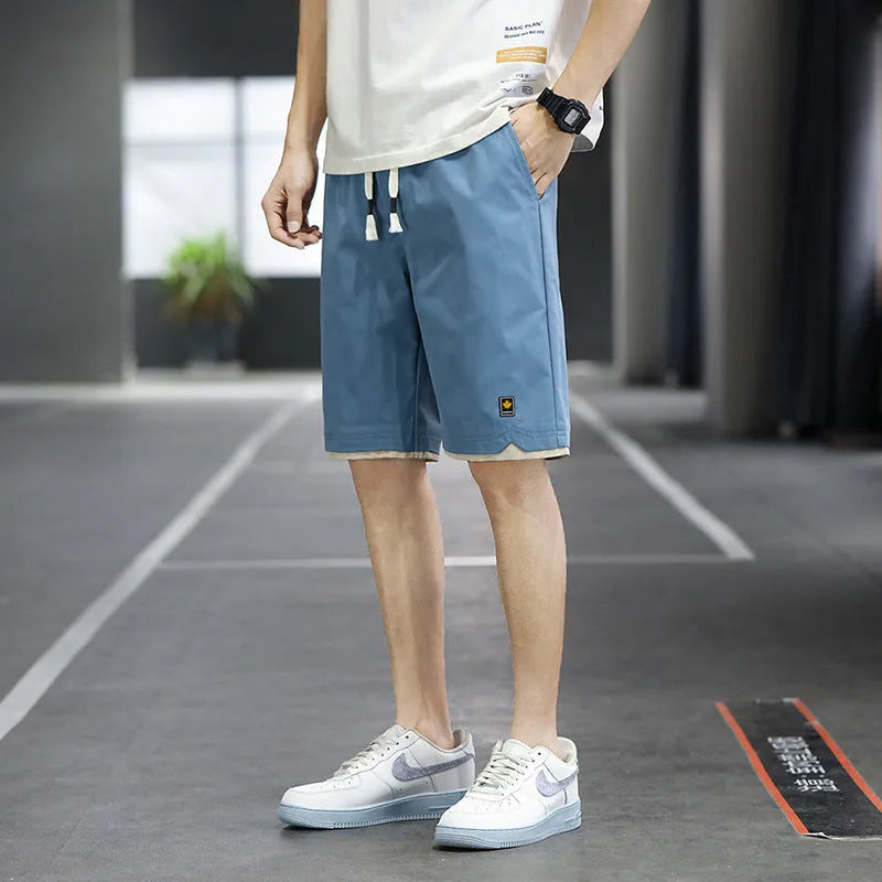 Korean style men's casual beach shorts in loose straight fit with elastic waistband