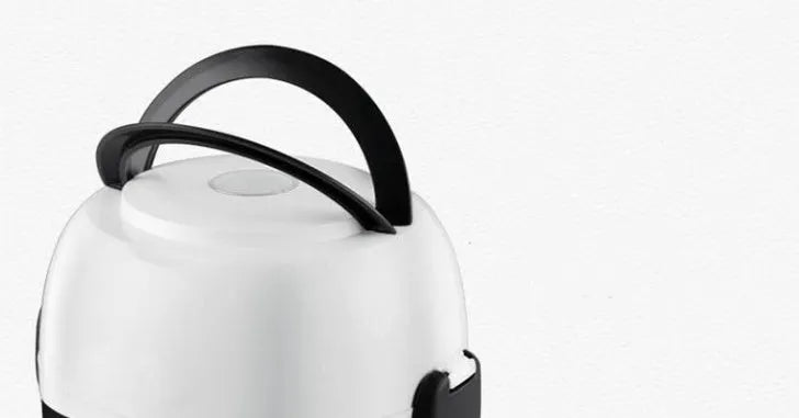 White rice cooker with stainless steel steaming basket, 2 litre capacity, 200w power rating