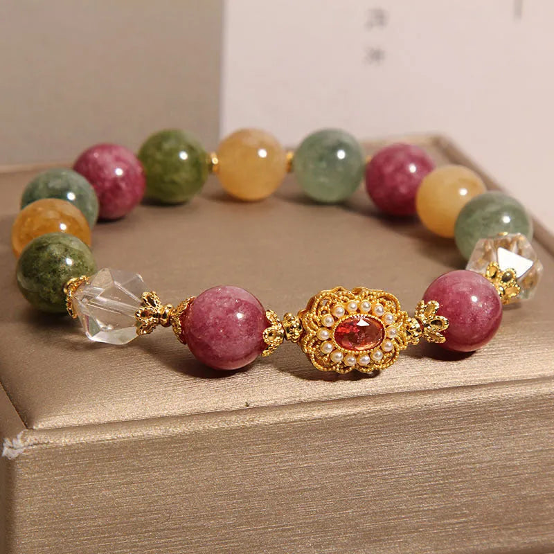 Women's jade colour tourmaline bracelet with alloy setting and rhinestone elements on pearl crystal base