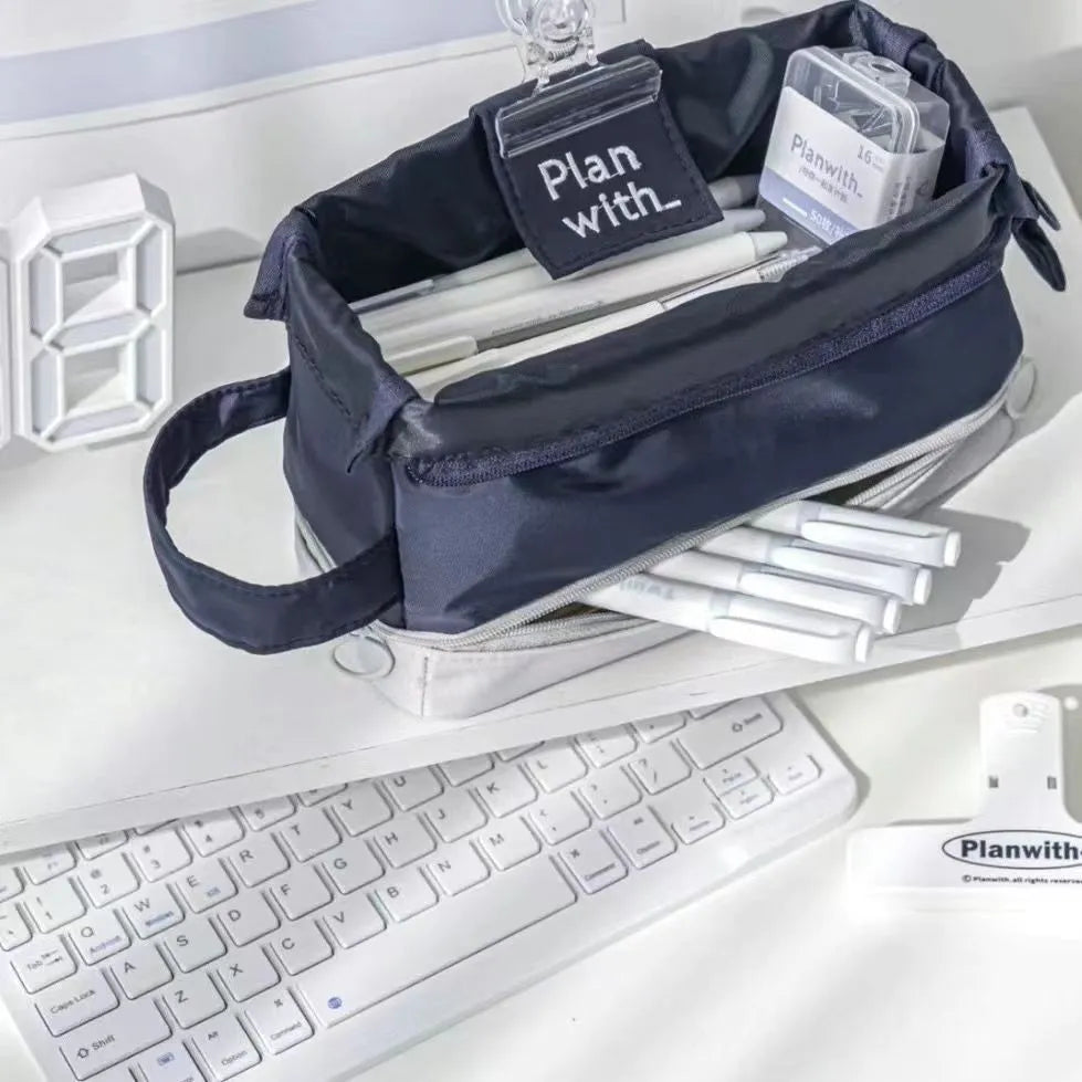 Polyester folding double-layer pencil case in dark blue, blue, or cream white.