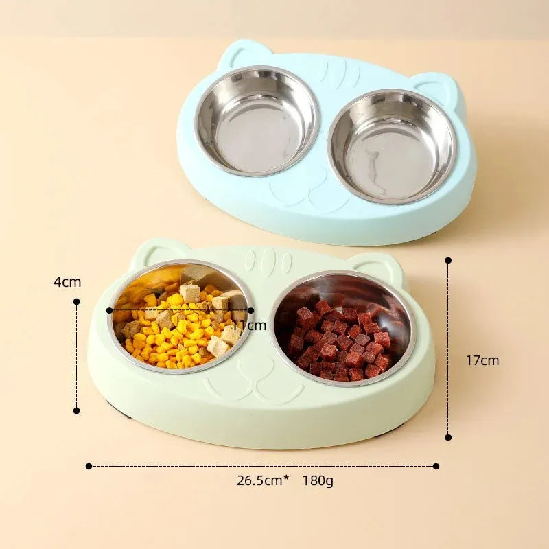 Blue plastic macaron-shaped double bowl pet feeder tray with a non-slip base and centre divider.