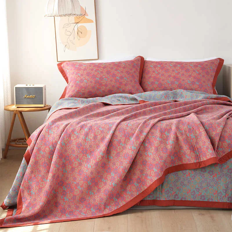Three-piece cotton gauze bedding set with floral pattern blanket and matching pillowcases