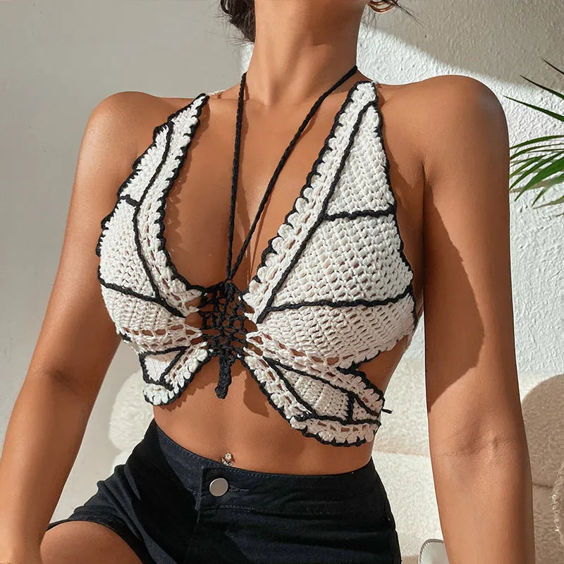 Women's black and white classic bikini swimsuit made from acrylic fabric.