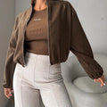Women's brown lantern sleeve short coat with loose casual fit and pocket details