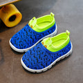 Mesh children's sports shoes in black with breathable hollow upper and PVC sole