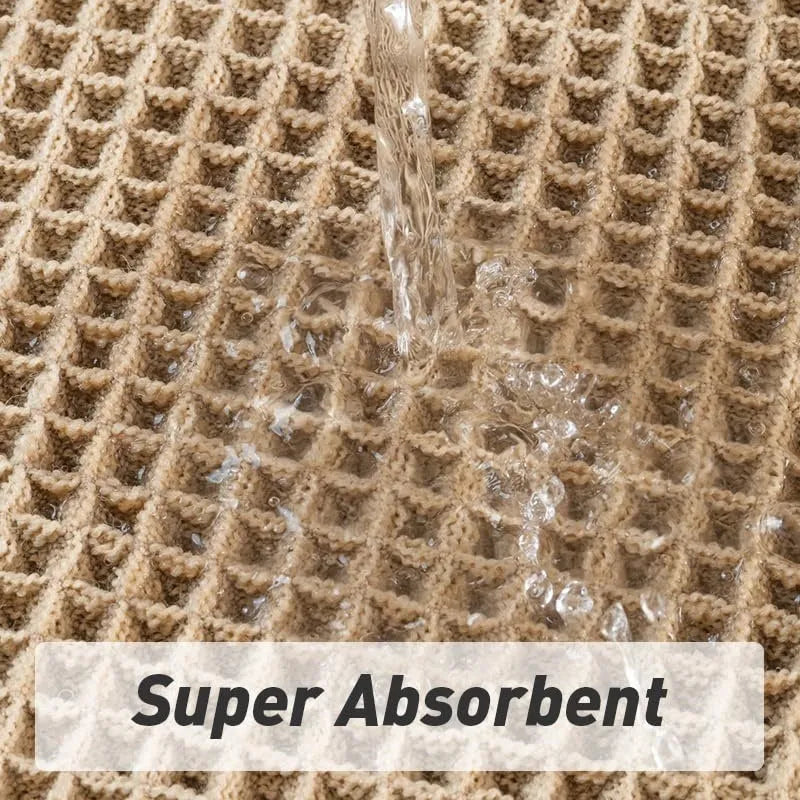 A square, checkered-pattern bathroom carpet in a choice of colours on a tiled floor.