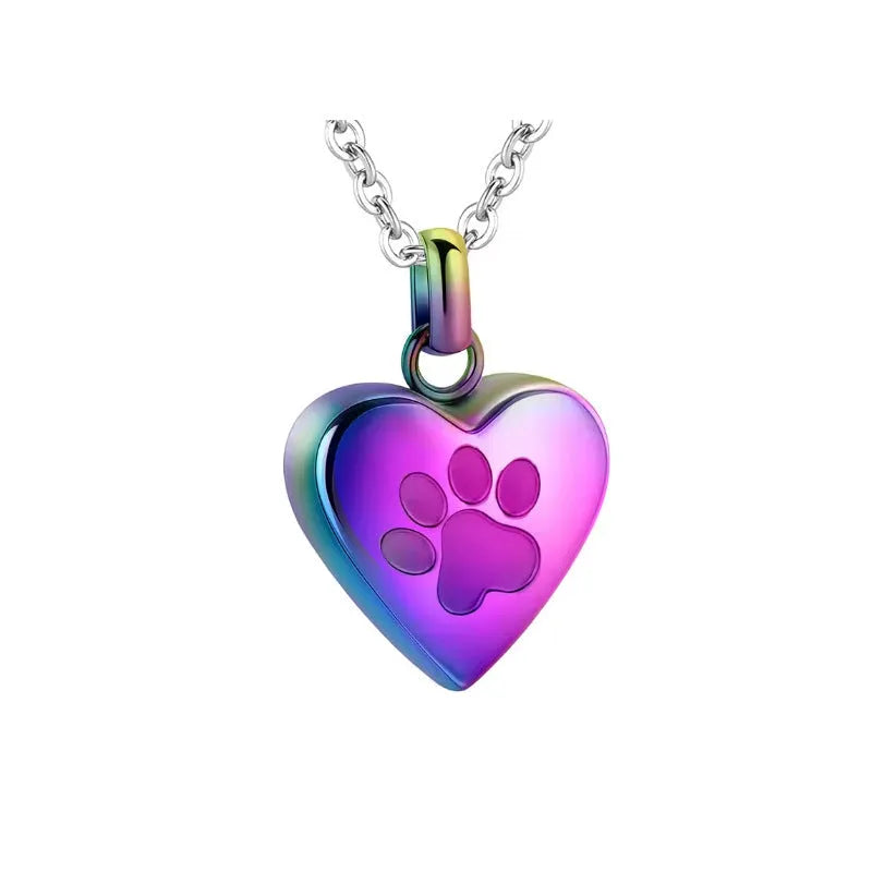 Titanium steel heart pendant necklace with paw print engraving, shown in silver finish.