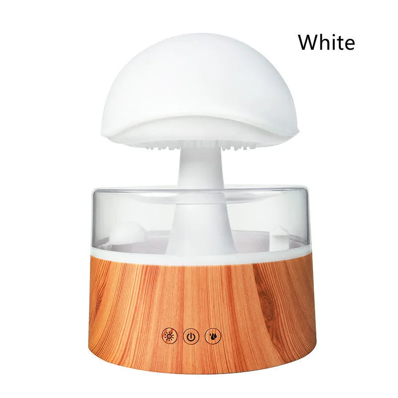 White cloud-shaped humidifier with simulated falling raindrops and coloured LED lighting