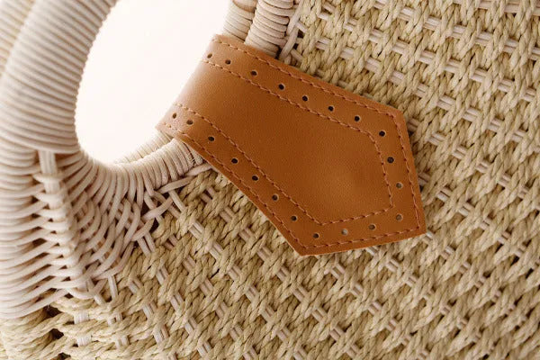 Rattan handbag in round woven straw style with hard shell and inner pocket