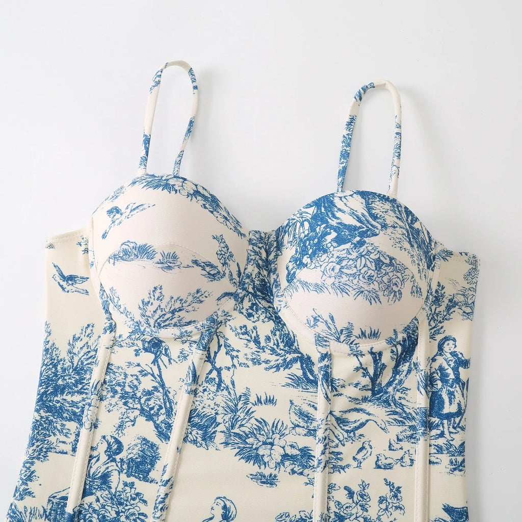 Blue women's one-piece polyester swimsuit with a separate matching gauze skirt.