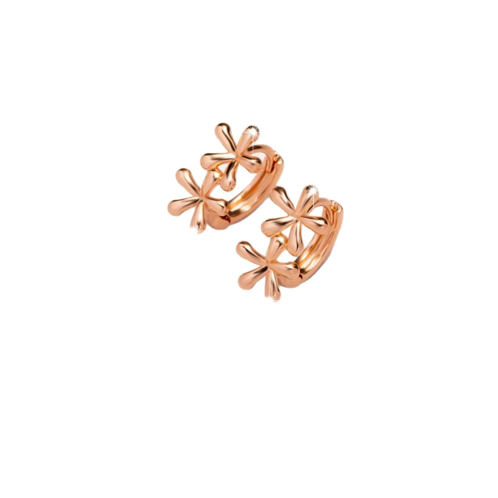 Rose gold circular earrings with a waterdrop flower design on a white background.