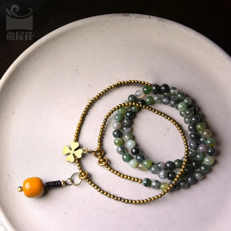Multi-layered natural crystal ethnic style bracelet for children showing layered design