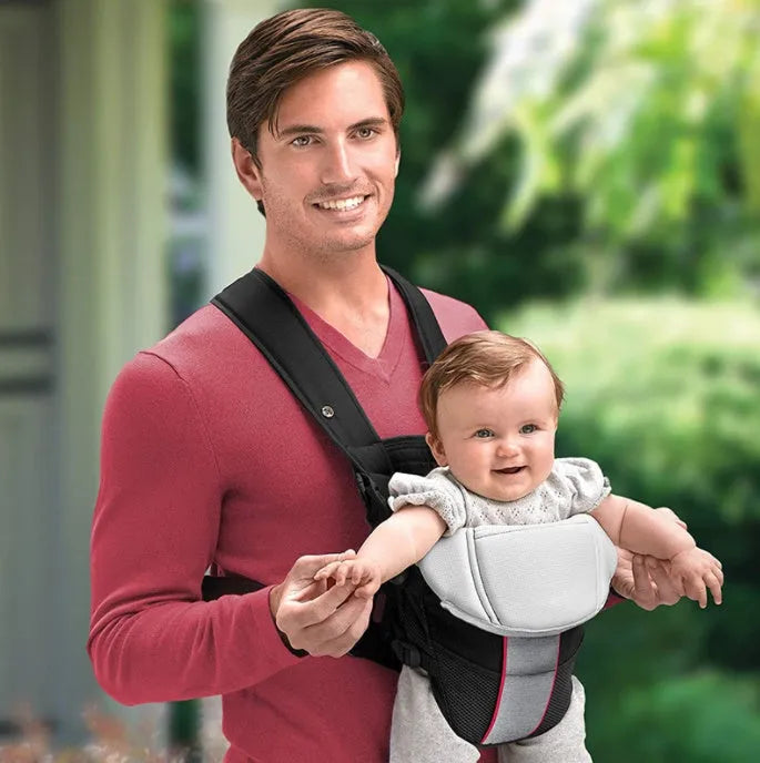 Double-shoulder baby carrier in red colour showing face-to-face carrying position