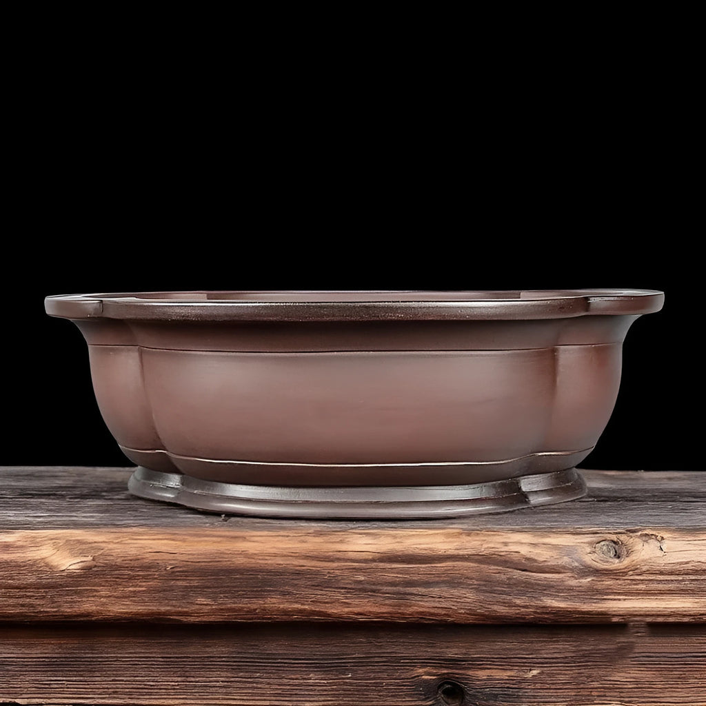 Handmade Chinese crabapple-shaped purple clay flowerpot for plants.