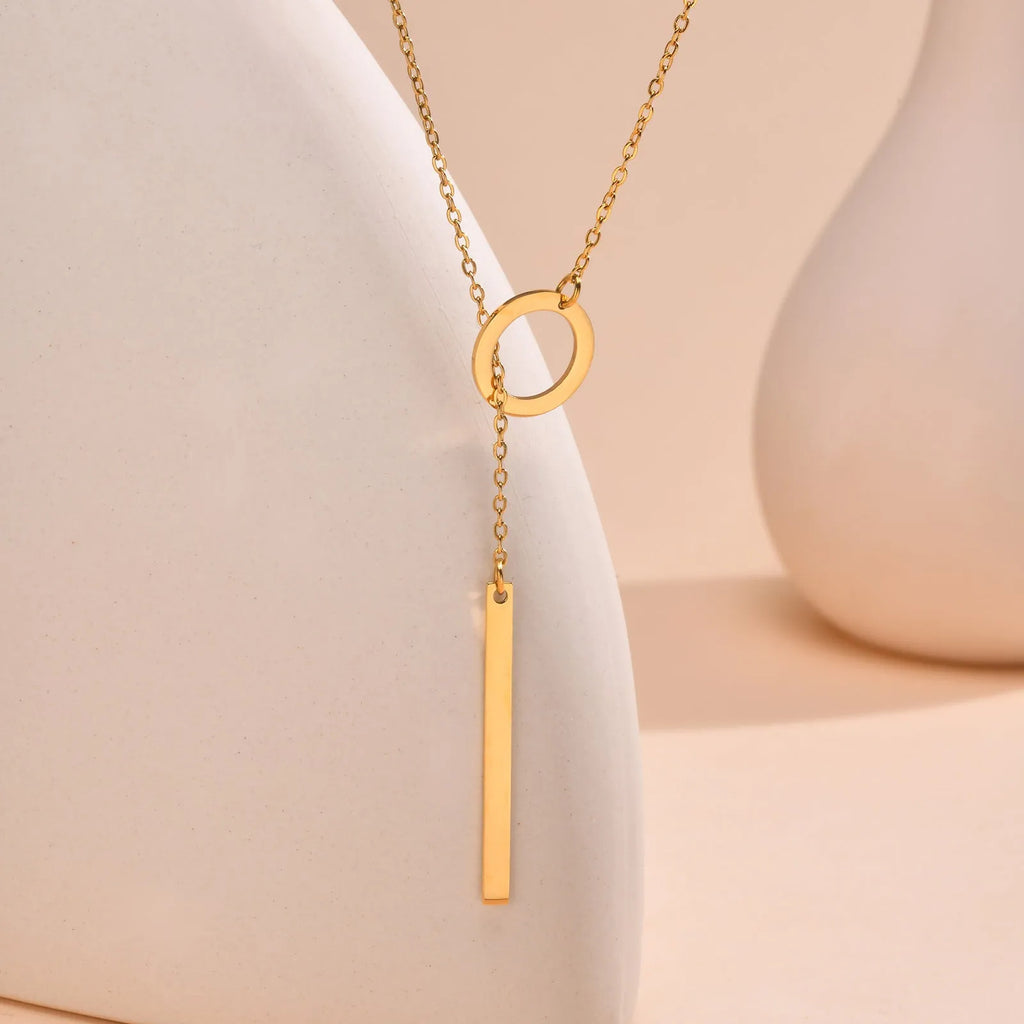 Gold electroplated stainless steel cross and ring geometric pendant necklace on O-link chain