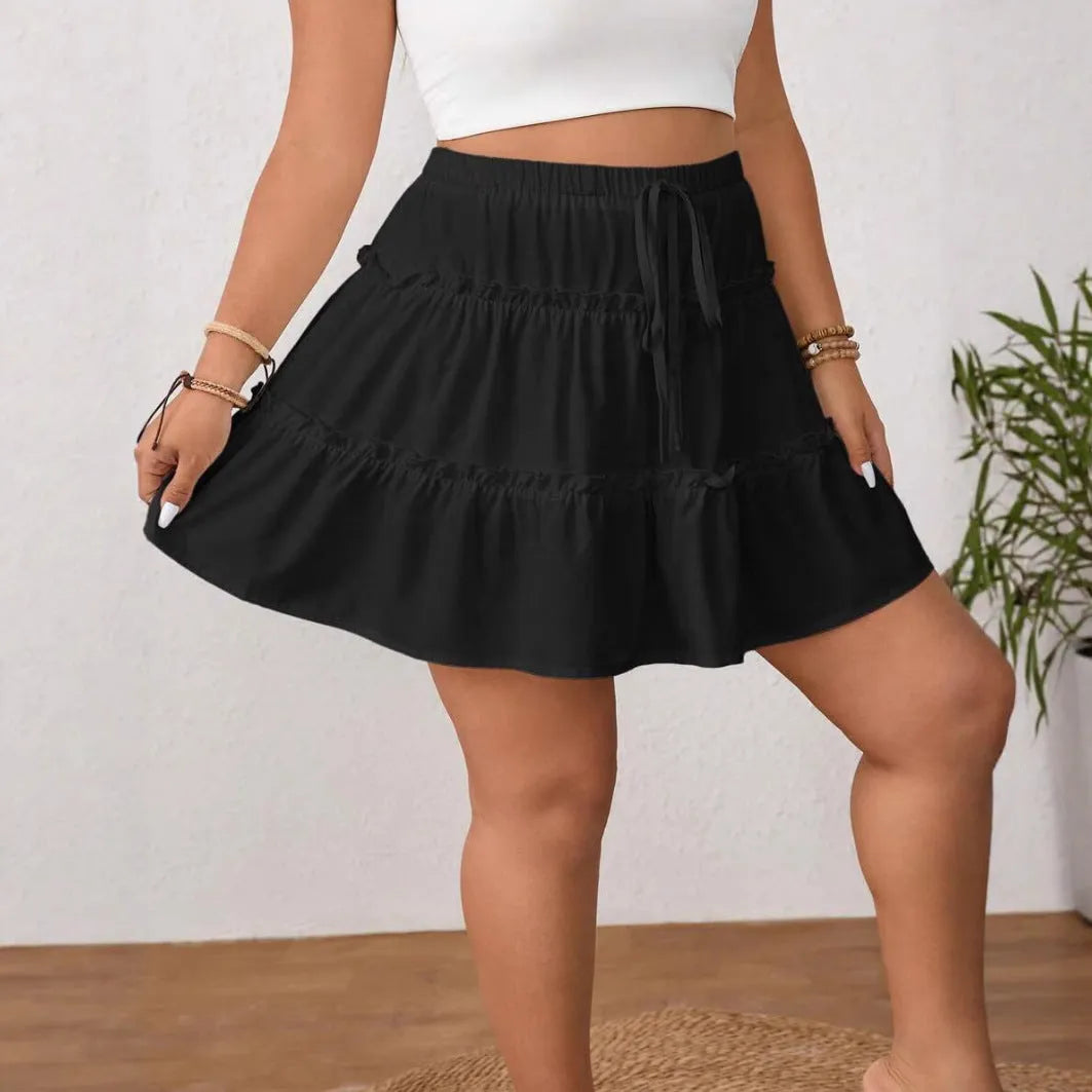 Women's white pleated A-line skirt with adjustable lace-up detail and sweet style design