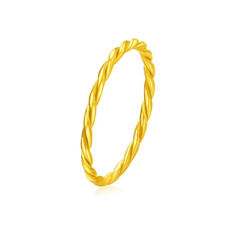 Women's simple bracelet style brass gold plated ring shown in twist, matte and glossy finish variations.