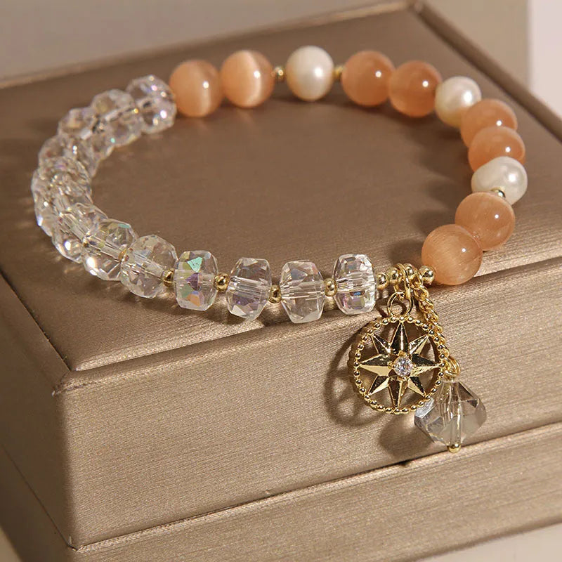 Orange eight Awn star women's bracelet with gold-plated inlay setting and opal crystal accents