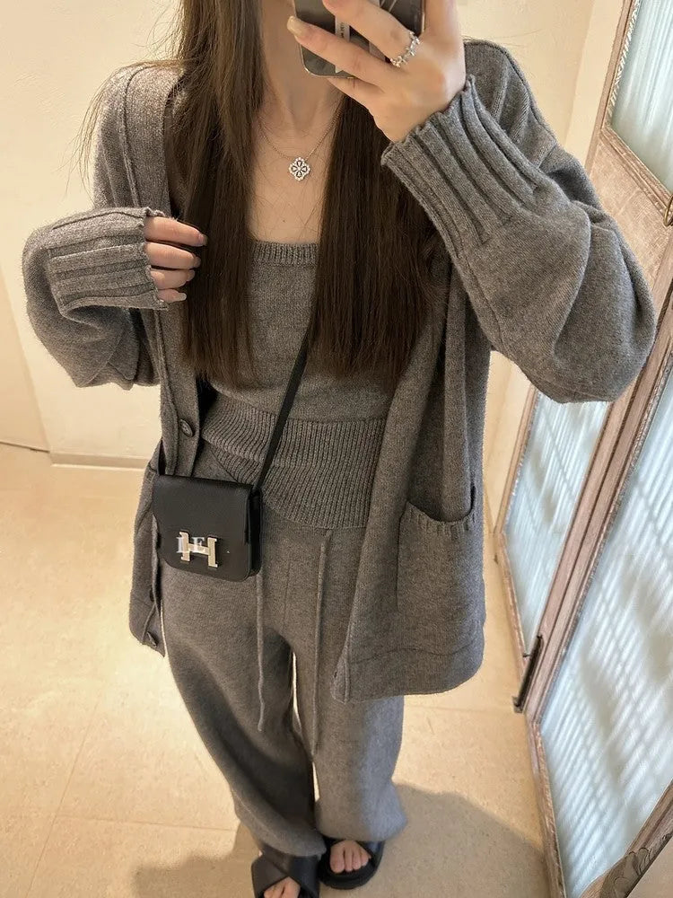 Women's light brown wool blend knit cardigan, vest, and loose pants three-piece casual set.