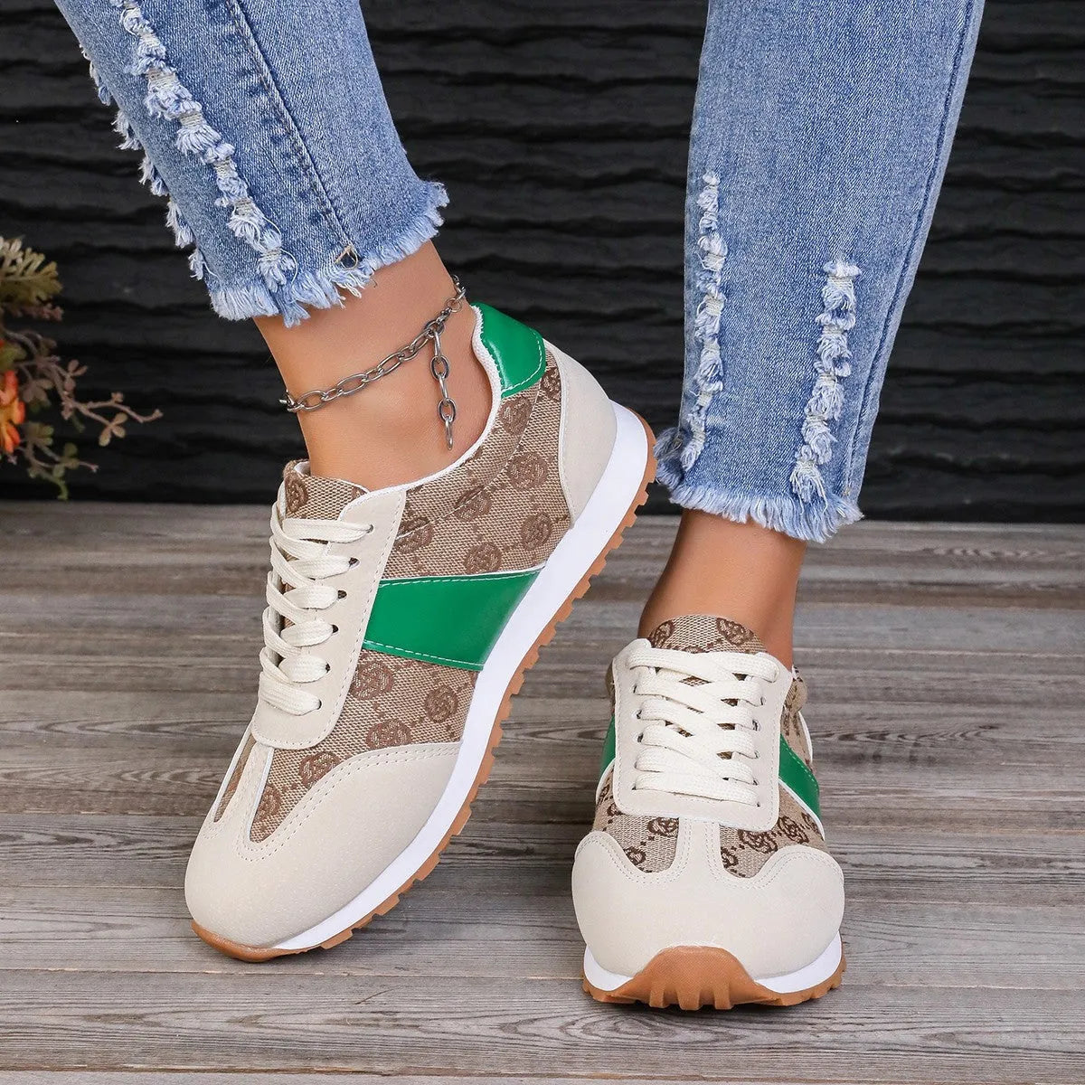 Women's oversized casual lace-up shoes with floral design in khaki colour showing round toe and cross-strap detailing