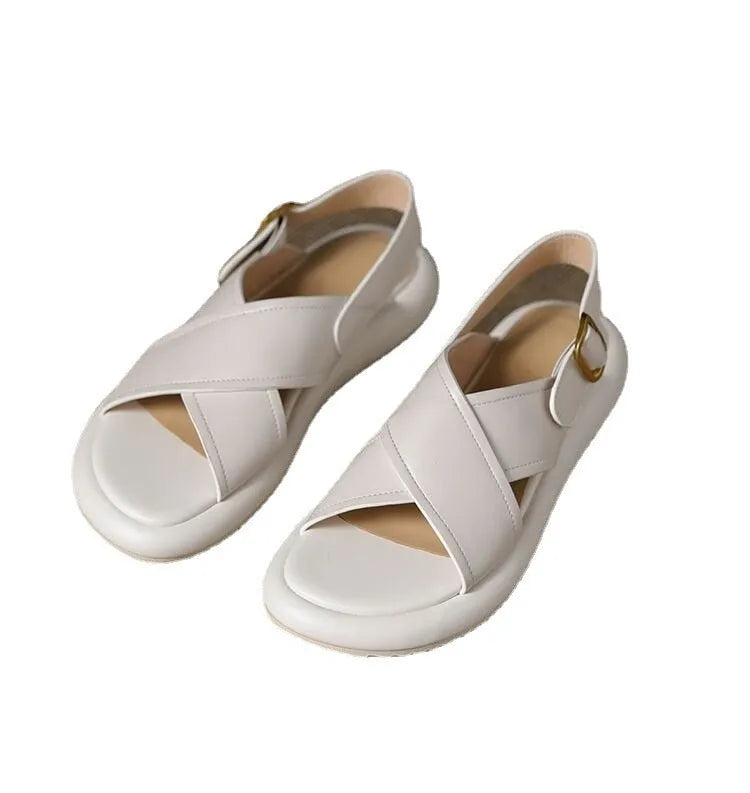 Women's flat non-slip cross Roman sandals in white with a microfiber upper and polyurethane sole