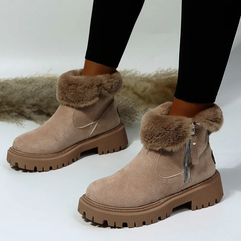 Women's black thick plush snow boot with side zipper and round toe on a rubber sole.