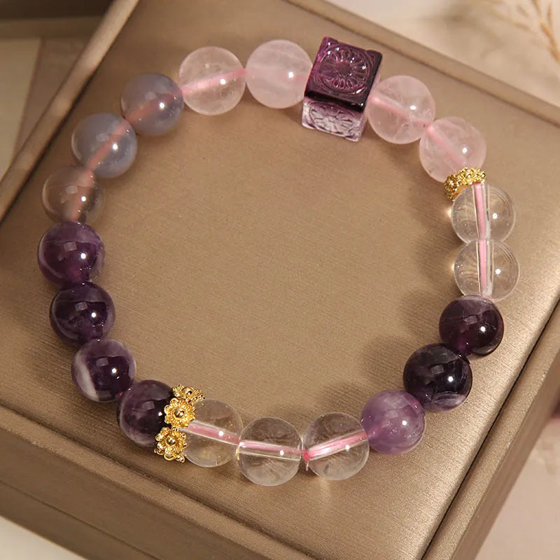 Purple women's bracelet with natural amethyst stones and crystal rhinestone design, measuring 10mm.