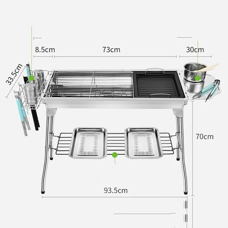 Stainless steel folding portable barbecue grill set up outdoors.
