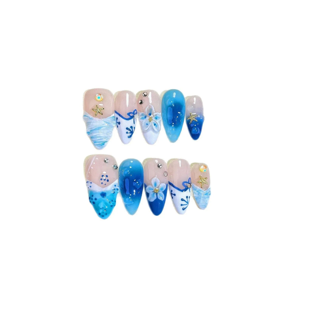 Blue plastic false nails with hand-painted carved summer ice transparent design in four sizes