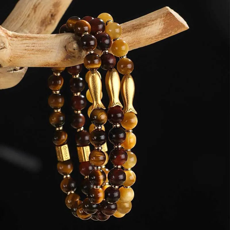 Handmade yellow tiger eye bracelet with small fish charm bead for women