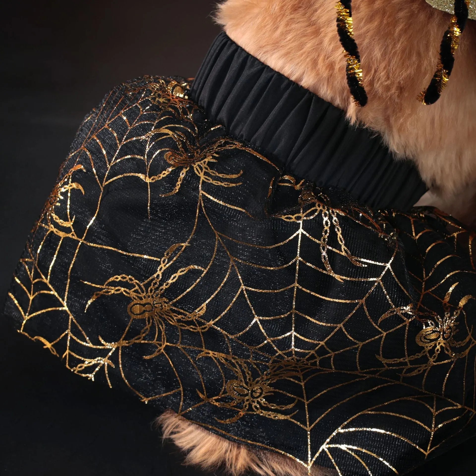 A dog wearing a polyester Halloween costume suit in a suit style.