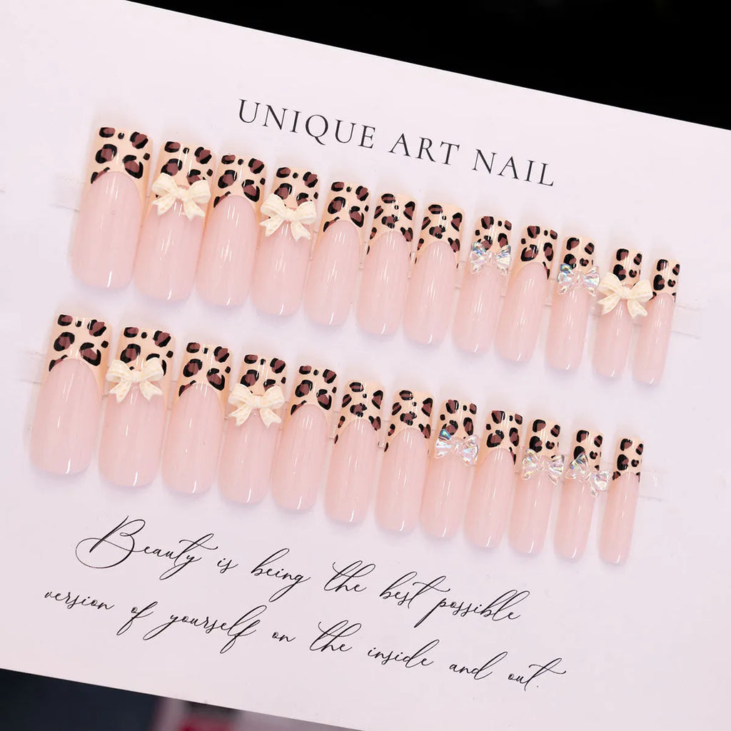 Leopard print false nails with butterfly designs in WM296 colour for women's manicure