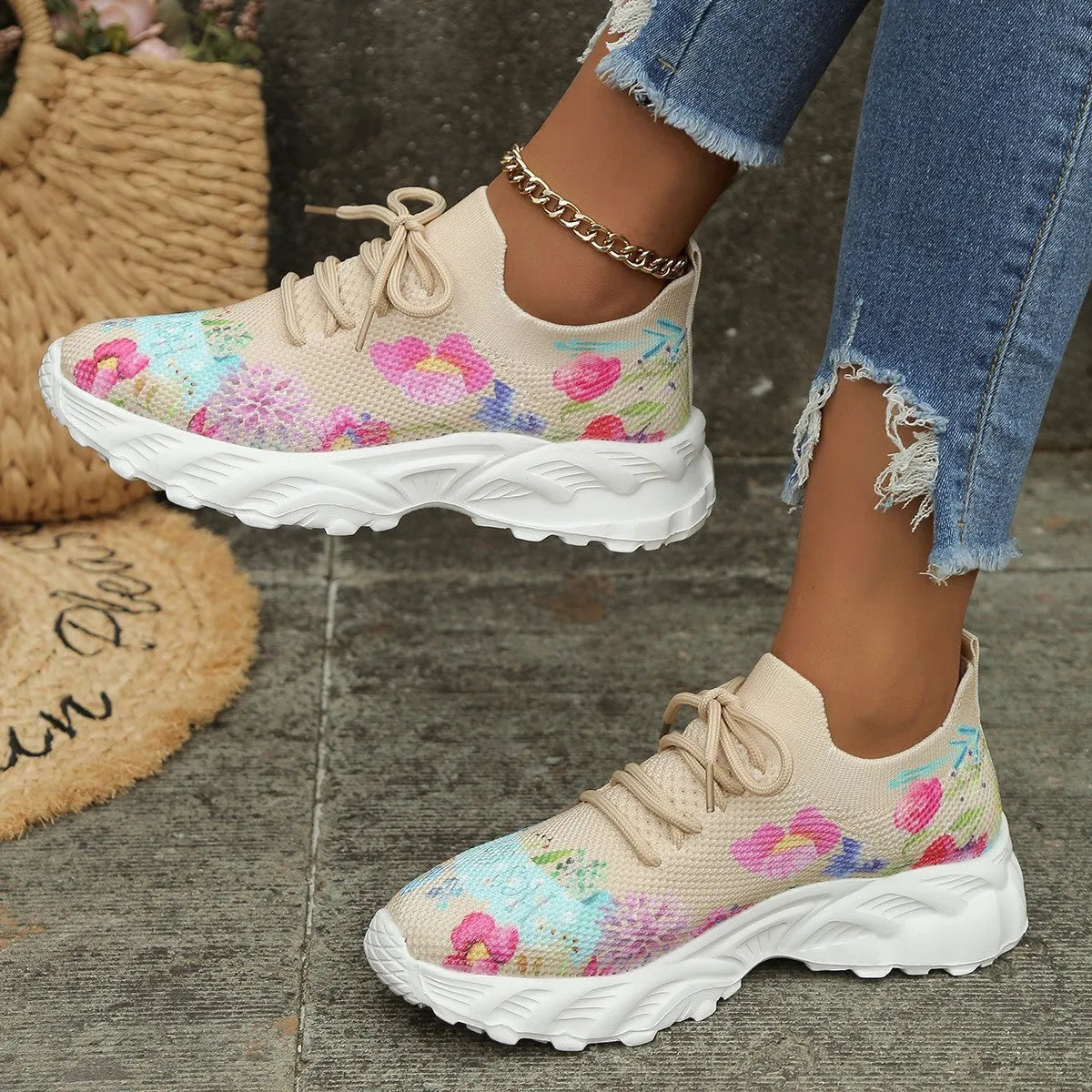 Women's floral print canvas walking sneakers with lace-up closure and rubber sole in pink