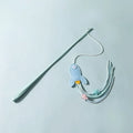 Blue rocket cat teaser toy with feathers on long pole for interactive play with kittens and cats