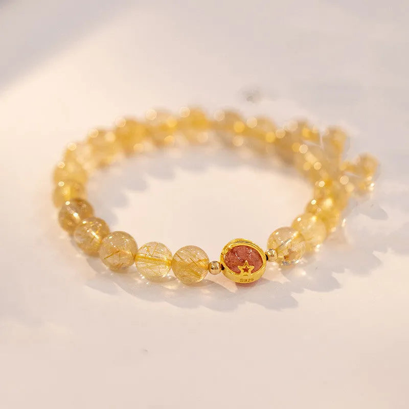 Gold rutilated quartz crystal bracelet with diamond-shaped beads in unisex Korean style