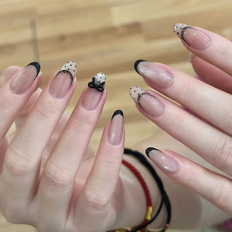 A selection of false nails in various colours and sweet girl style patterns, shown in packs of 5, 10, or 15 sets.