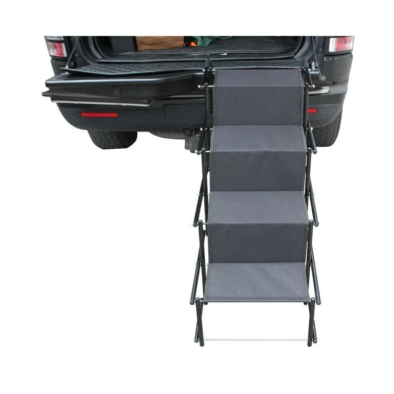 Stainless steel folding dog ladder next to a car, showing navy blue steps and a 101x76x45cm frame.