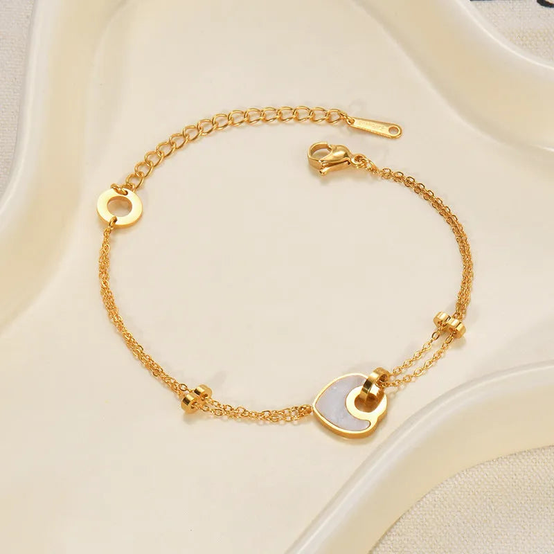 Double-layer stainless steel and resin heart bracelet for women with electroplated finish