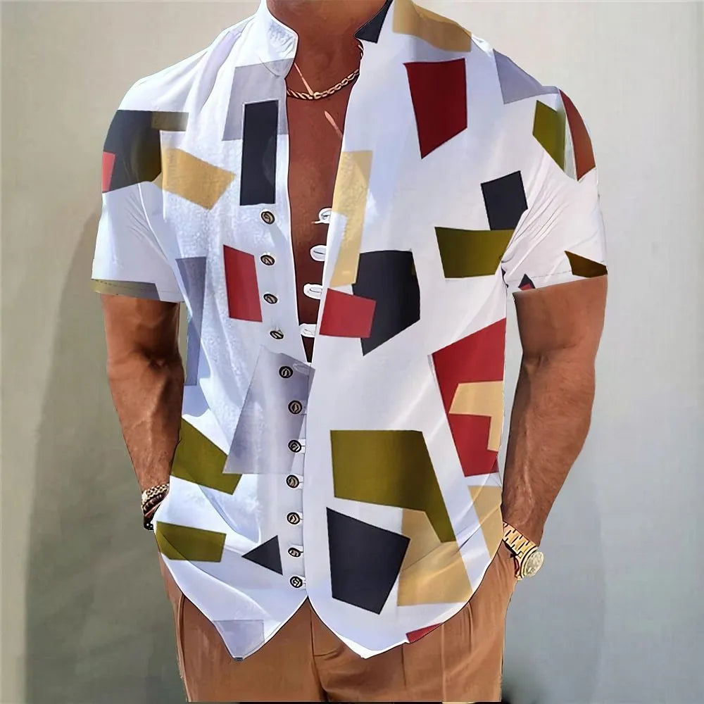 Youth model wearing a short sleeve cardigan with a blue and white geometric floral print pattern.