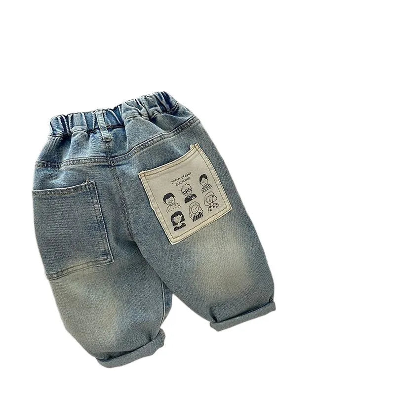 Light-coloured boys denim jeans with printed back pocket and elastic waist, front view