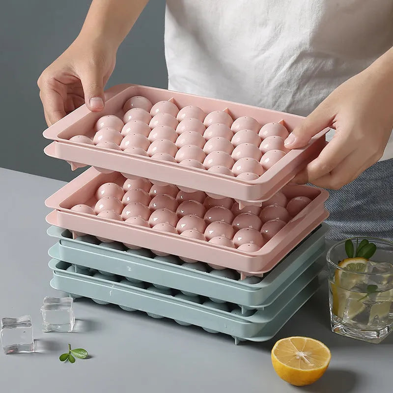 Sky blue 3D round ice ball mould tray with spherical ice cavities for home bar use