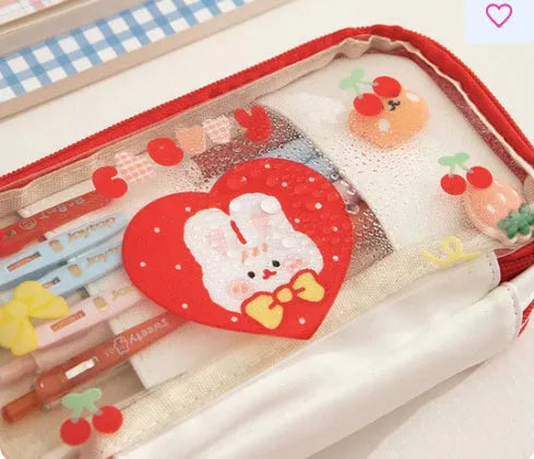 Transparent TPU pencil case with Japanese girl heart rabbit designs in red and pink colour options