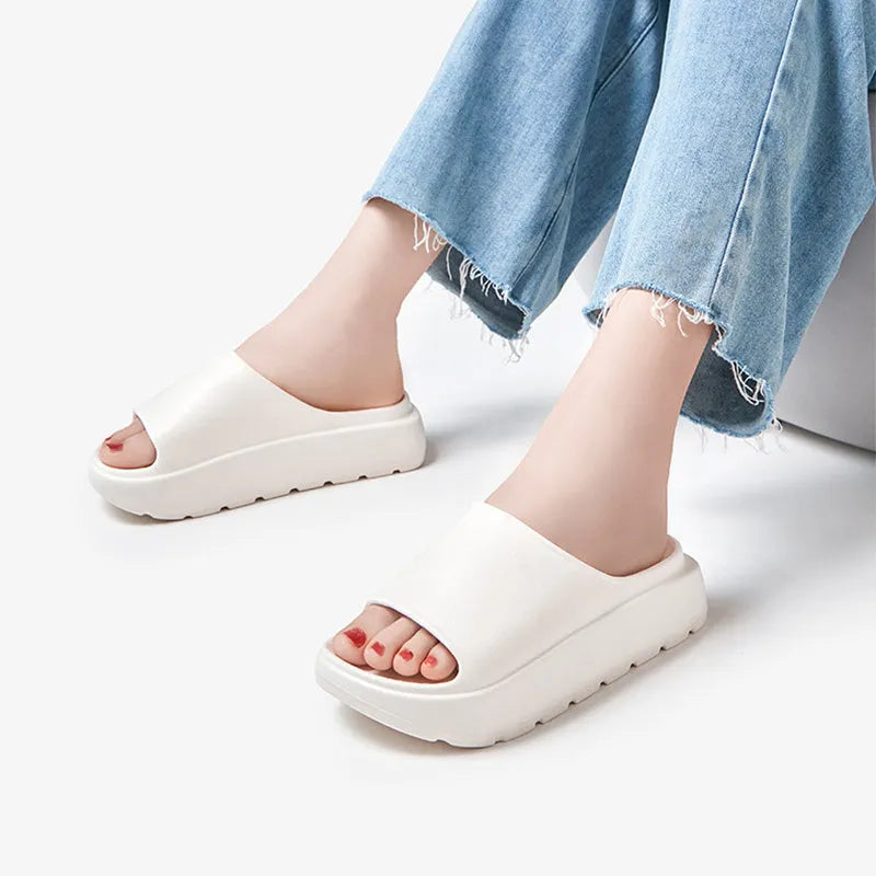 Women's thick sole fish mouth slippers in beige colour, showing the elevated EVA outsole.